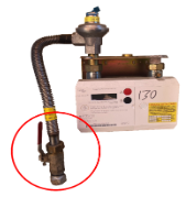 Image of an ECV (Emergency Control Valve), which is usually a red plastic or metallic handle which isolates the supply of gas to your meter and beyond. The ECV is highlighted by a red circle.
