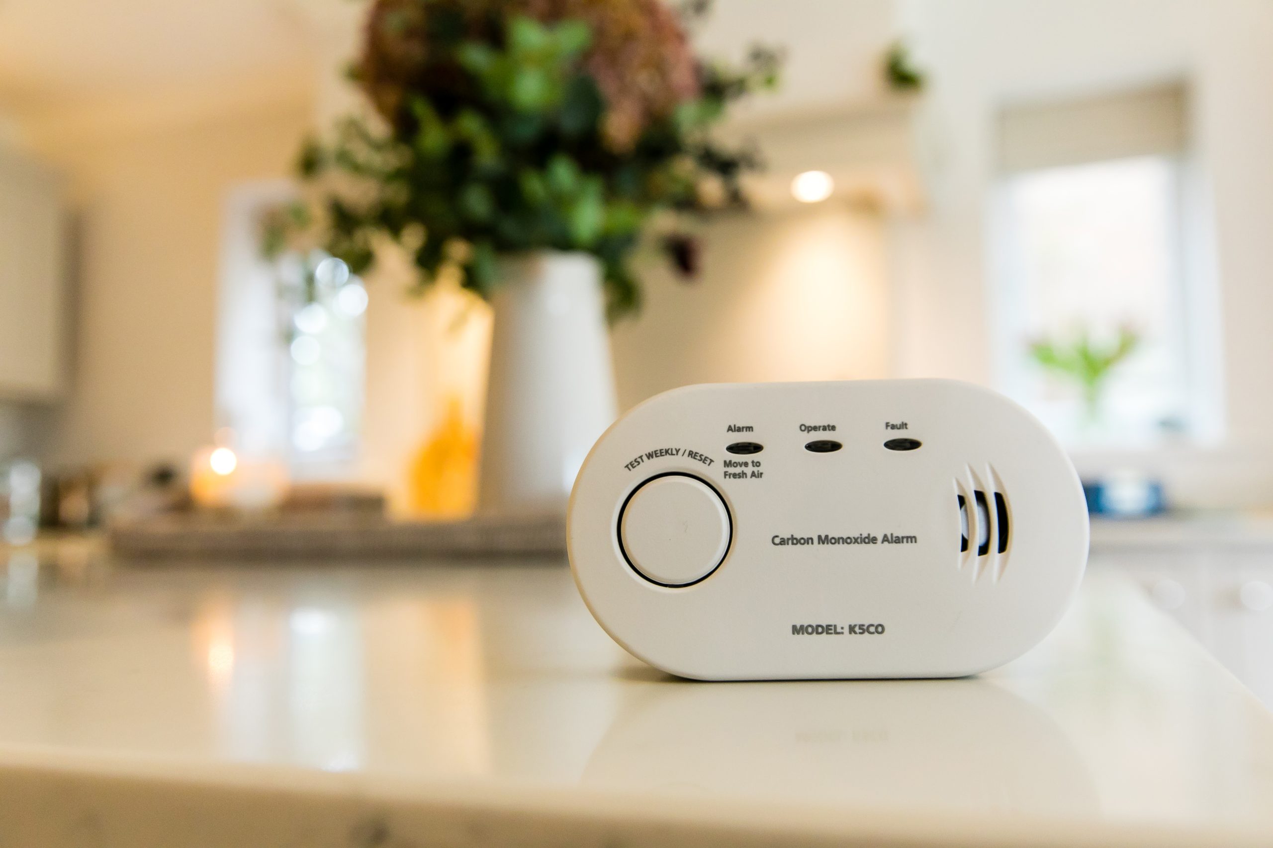 A Carbon Monoxide alarm on a kitchen table
